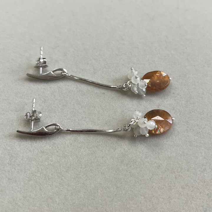Boucles d’oreilles avec pierre de soleil, en argent