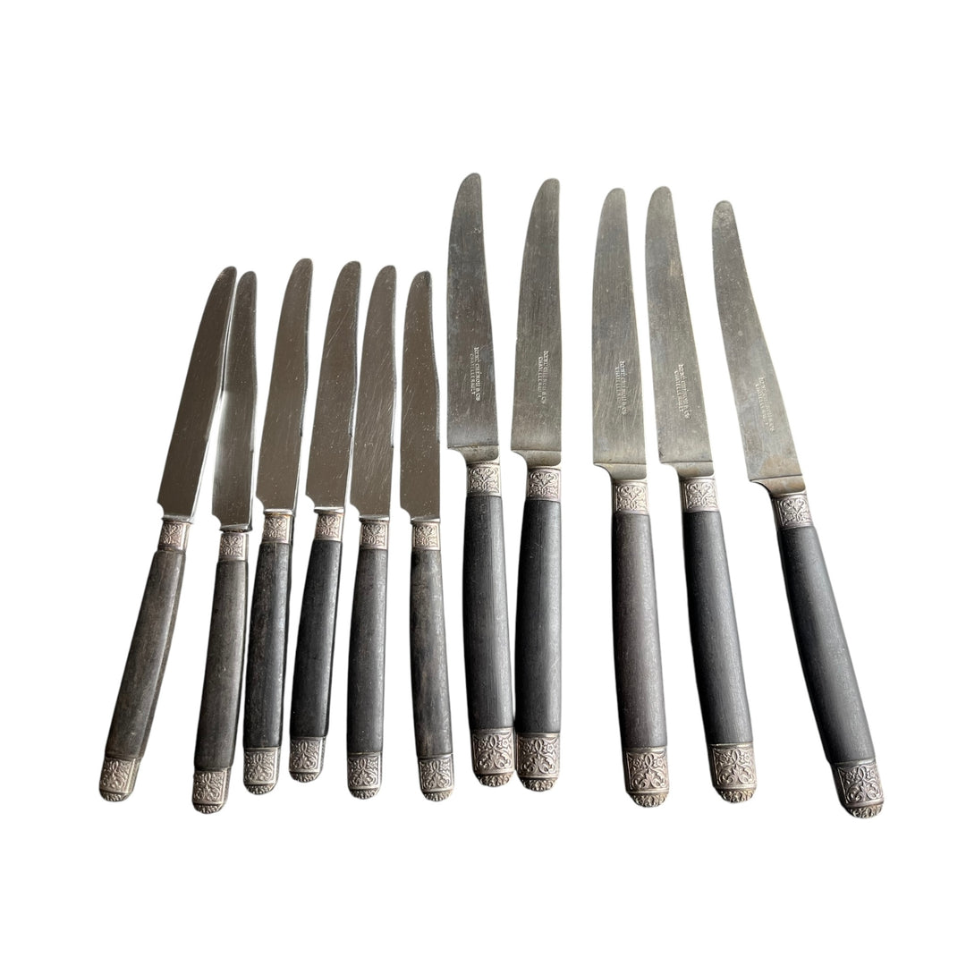 11 knives in ebony miter and virole in late 19th century silver