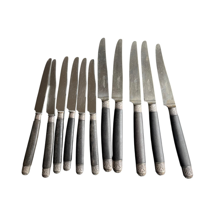 11 knives in ebony miter and virole in late 19th century silver