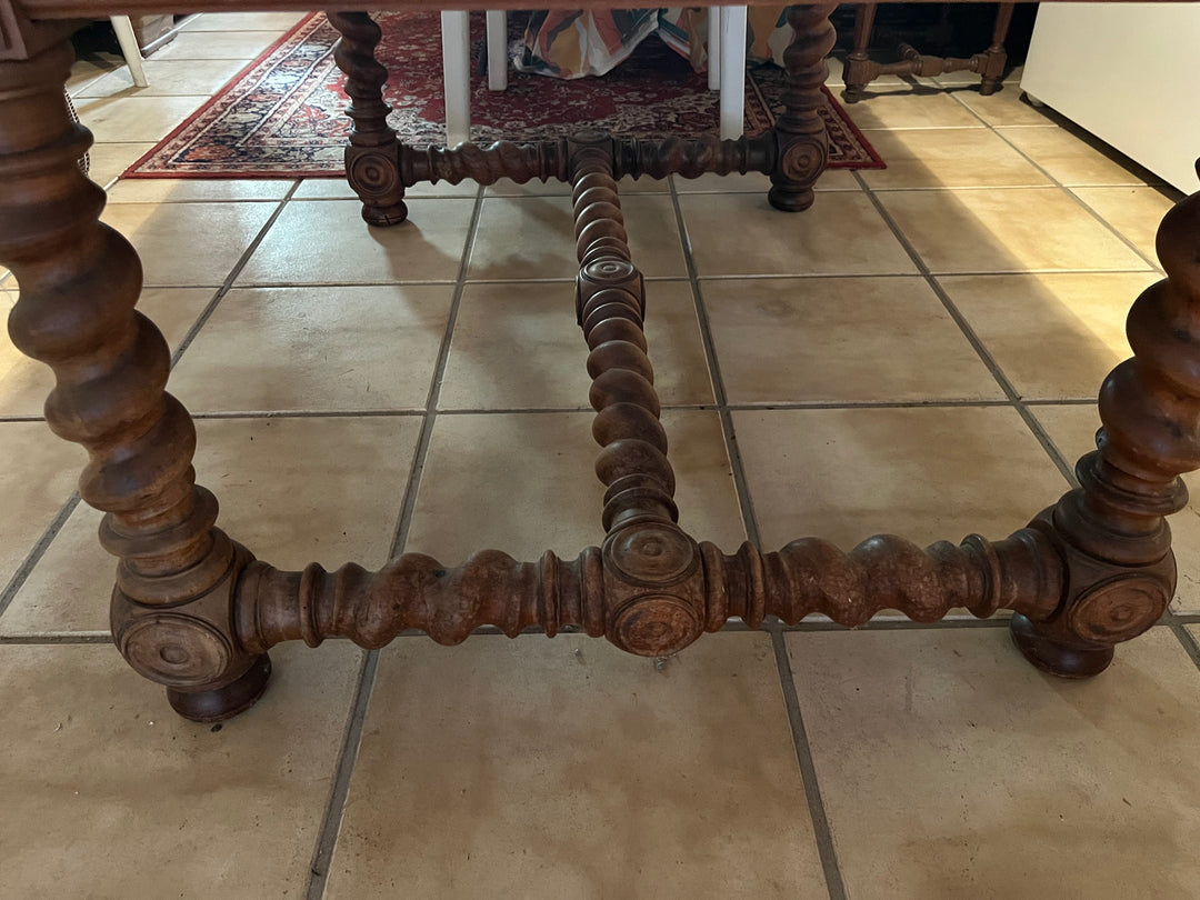 Wooden dining table on foot turned in a spiral Louis XIII style