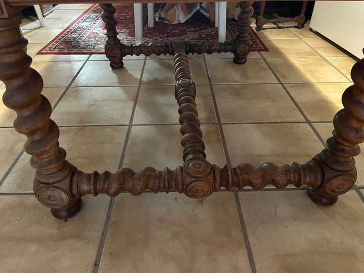 Wooden dining table on foot turned in a spiral Louis XIII style