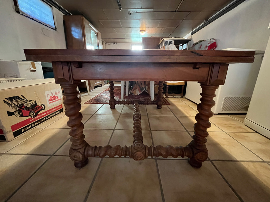 Wooden dining table on foot turned in a spiral Louis XIII style