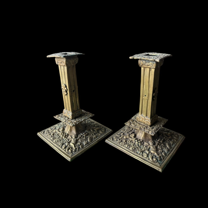 Pair of mestiers or candlesticks in the financial in bronze style high era