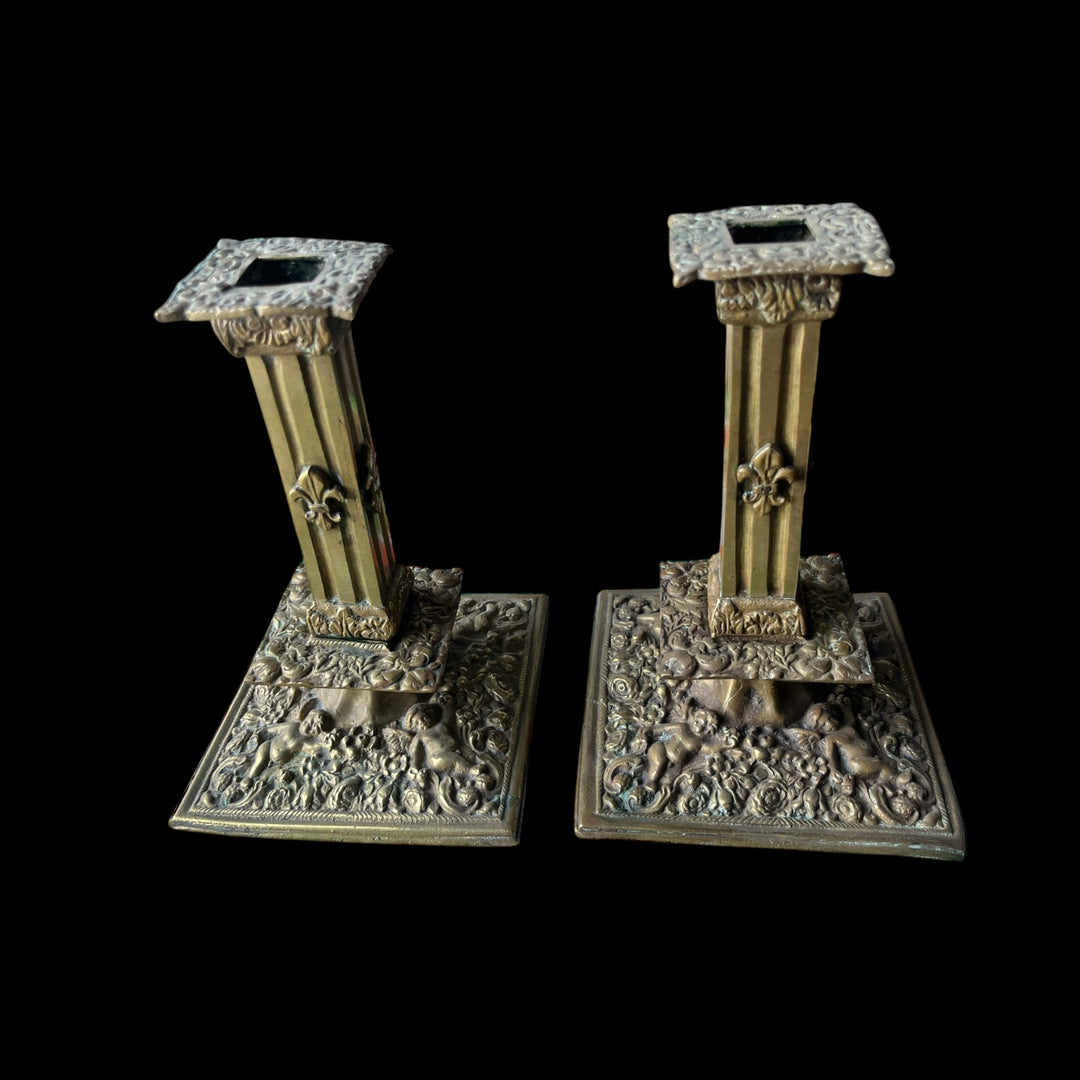 Pair of mestiers or candlesticks in the financial in bronze style high era