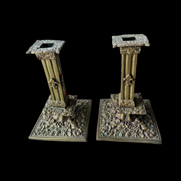 Pair of mestiers or candlesticks in the financial in bronze style high era