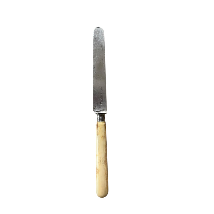 1 knife with a dessert Touron round in ivory and silver blade Paris