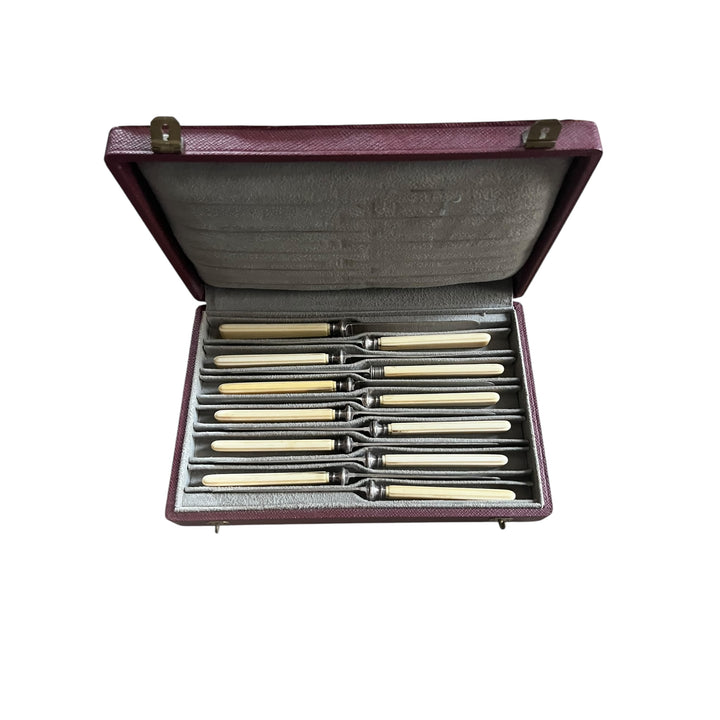 12 knives with a dessert Touron goldsmith of the king in ivory handle and silver blade old man paris