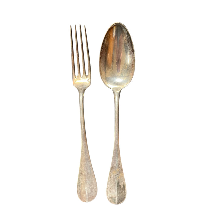 A large silver cover Ernest Compere Baguette model and quantified medallion