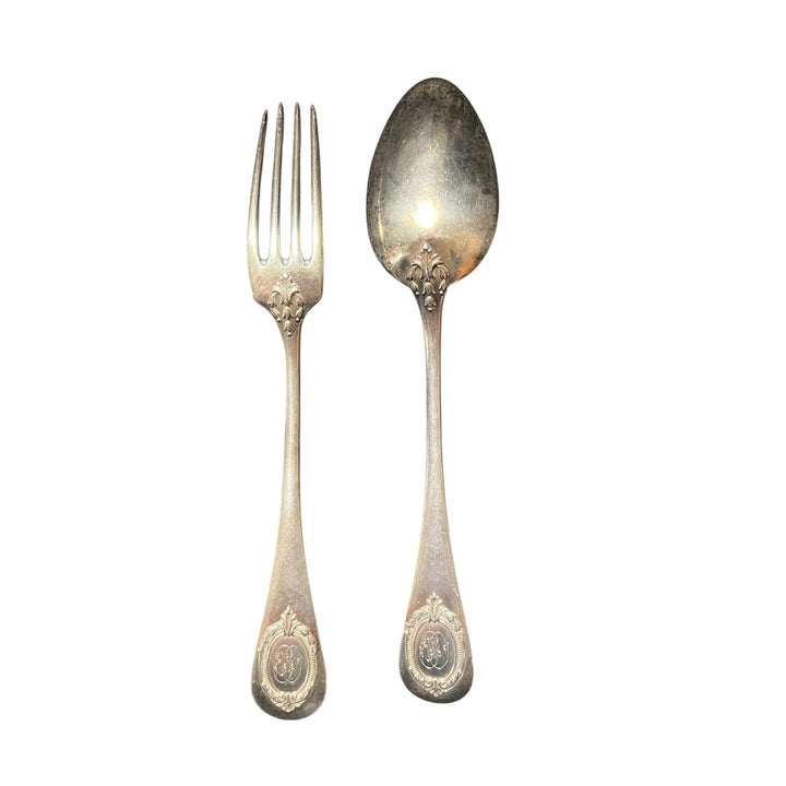 A large silver cover Ernest Compere Baguette model and quantified medallion