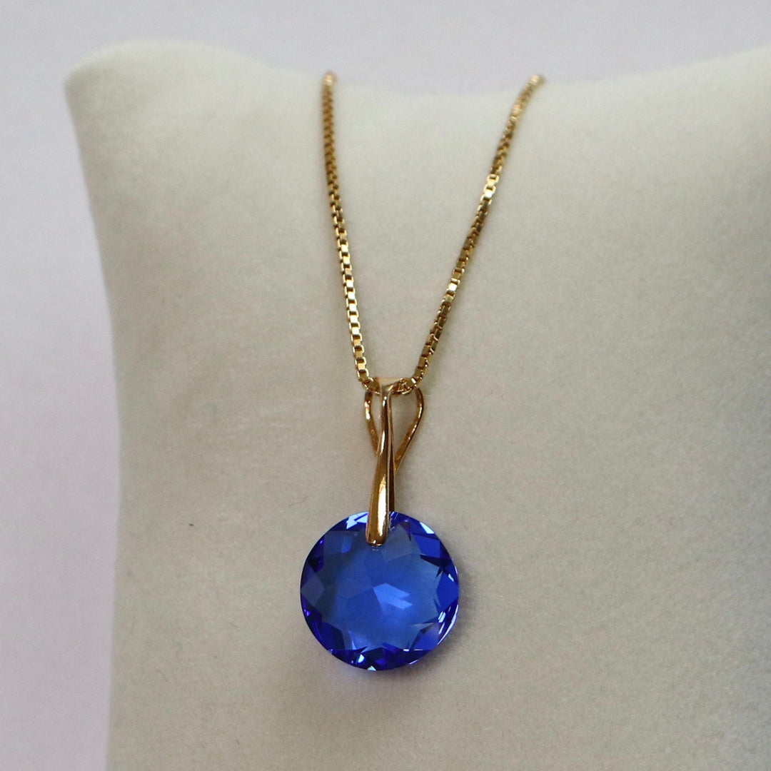 Pendant, Swarovski crystals, gold-plated silver, blue, BONBON