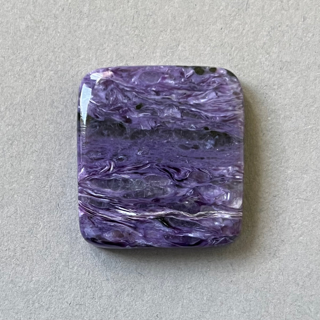 Charoite, CHR069, cabochon cut, 30x28x6 mm