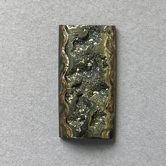 Ammonite pyritisée, AM_P261, taille cabochon, 37x19x7  mm