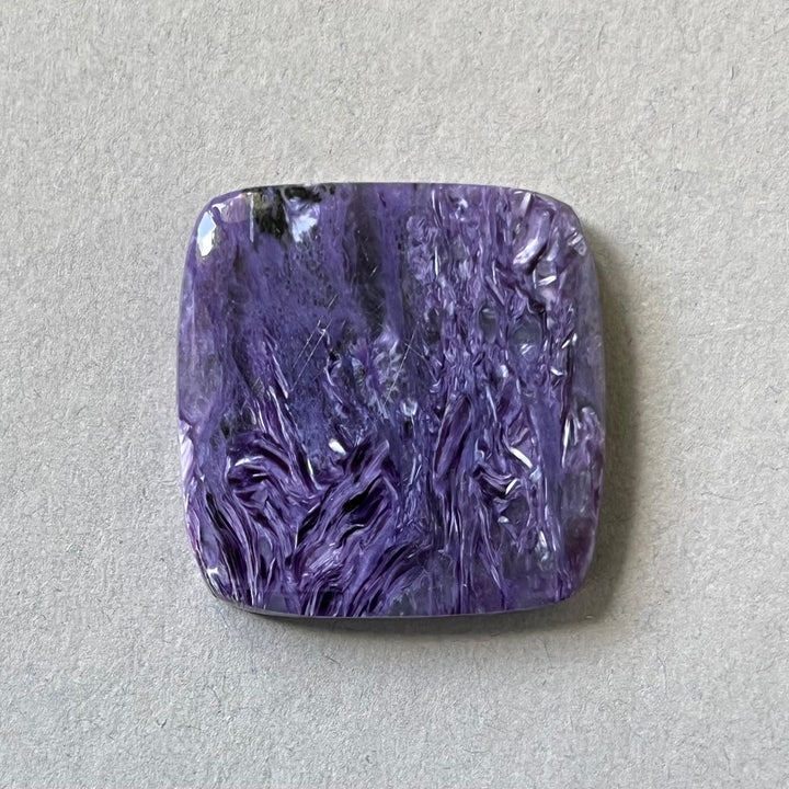 Charoite, CHR068, cabochon cut, 30x30x6 mm