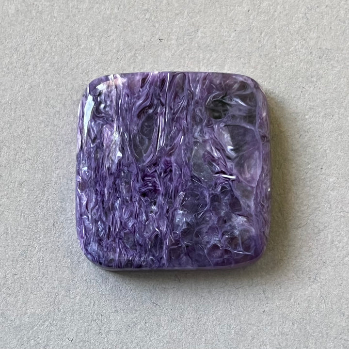 Charoite, CHR063, cabochon cut, 28x28x6 mm