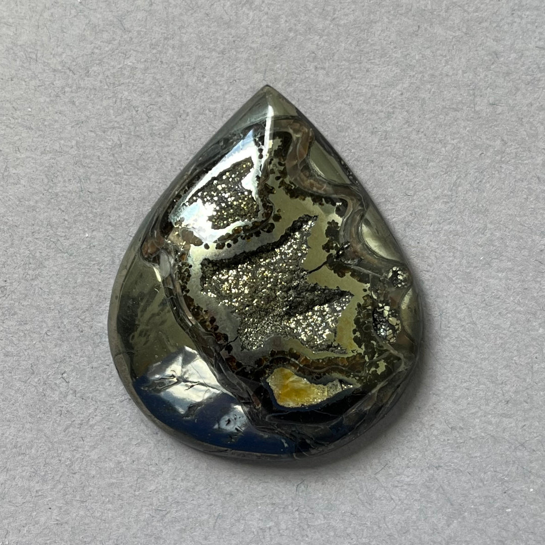 Pyritized ammonite, AM_P153, cabochon size, 38x31x7 mm