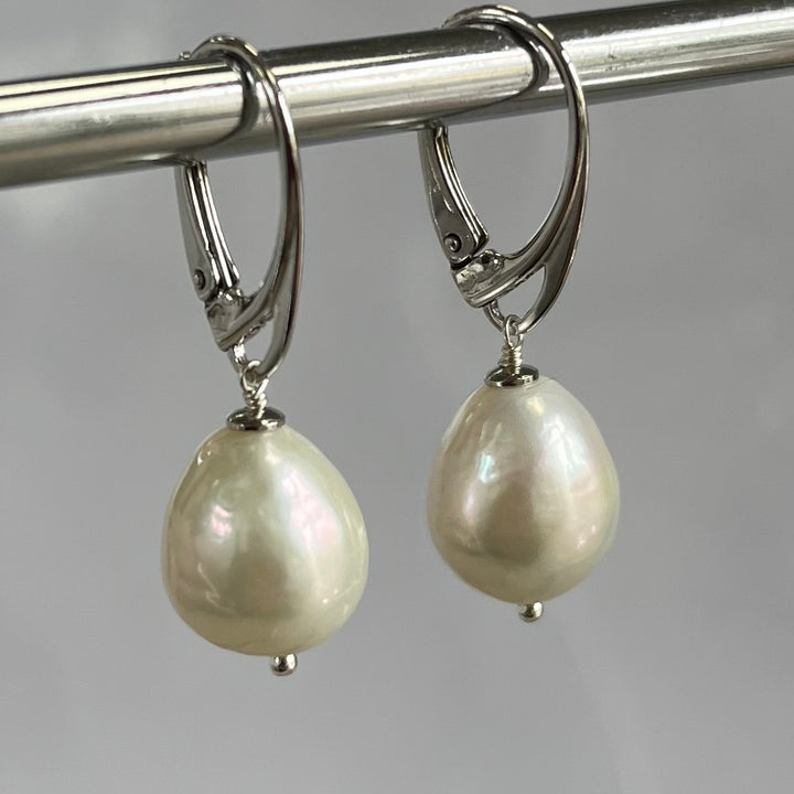 Earrings with white baroque pearls