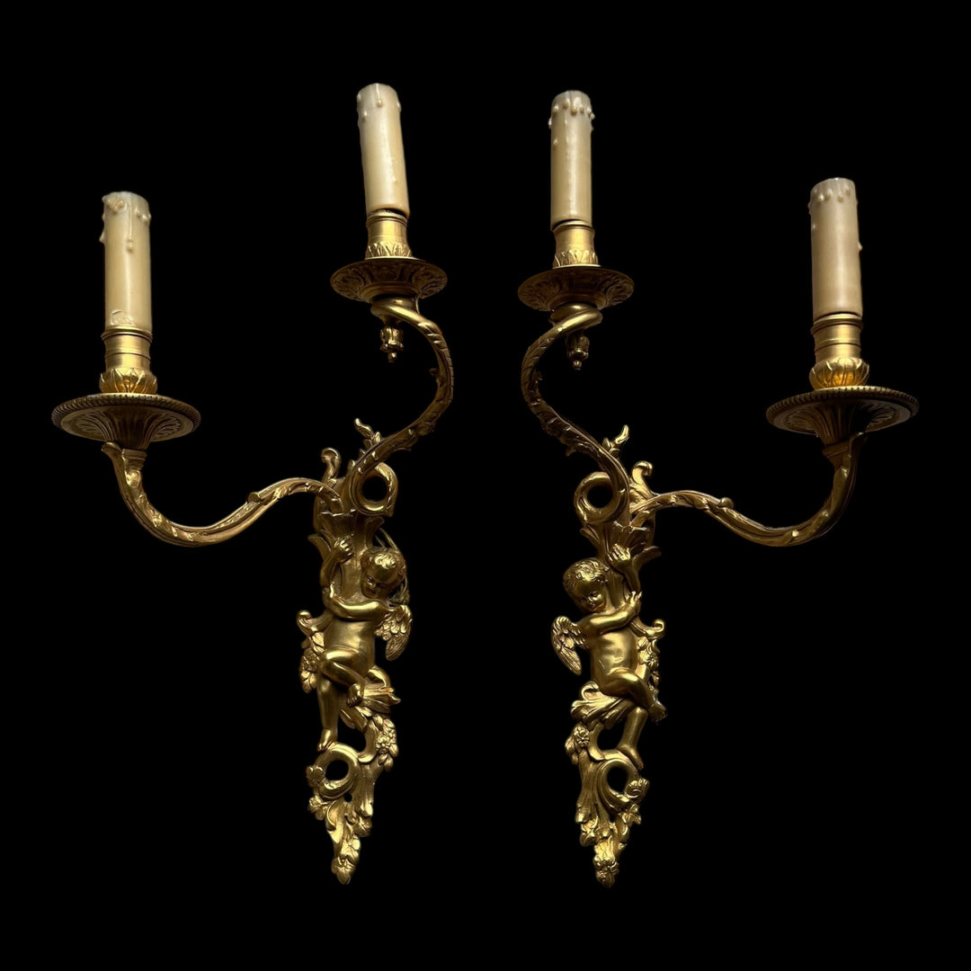 Paire appliques 2 bras lumière style Régence bronze doré putti angelots