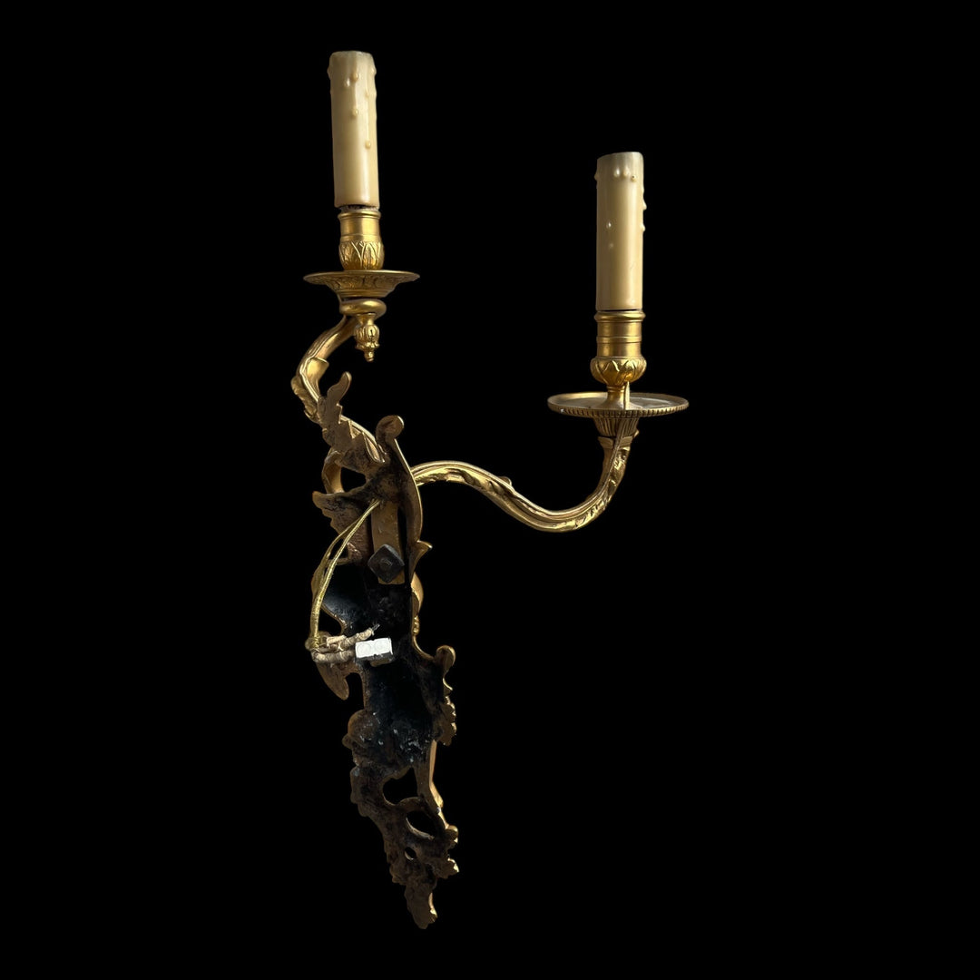 Paire appliques 2 bras lumière style Régence bronze doré putti angelots