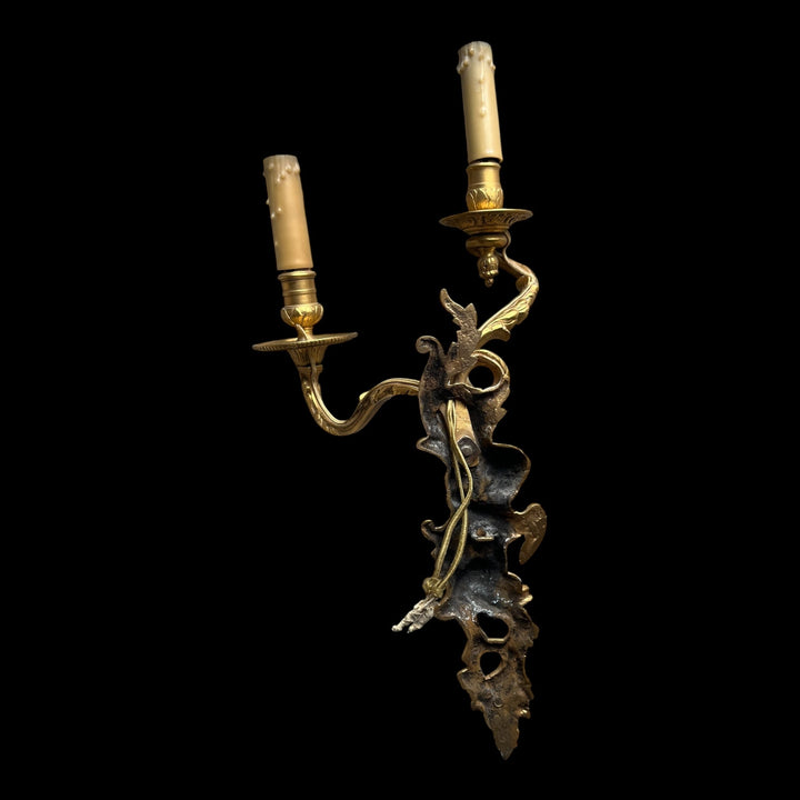 Paire appliques 2 bras lumière style Régence bronze doré putti angelots