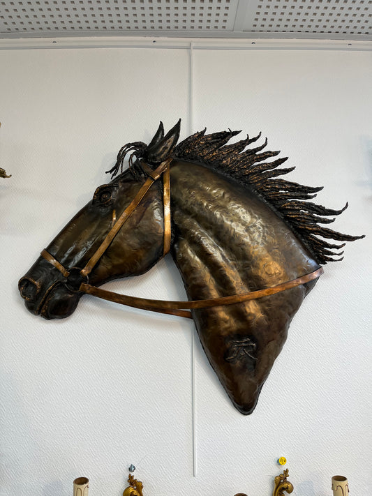 Copper horse head sculpture