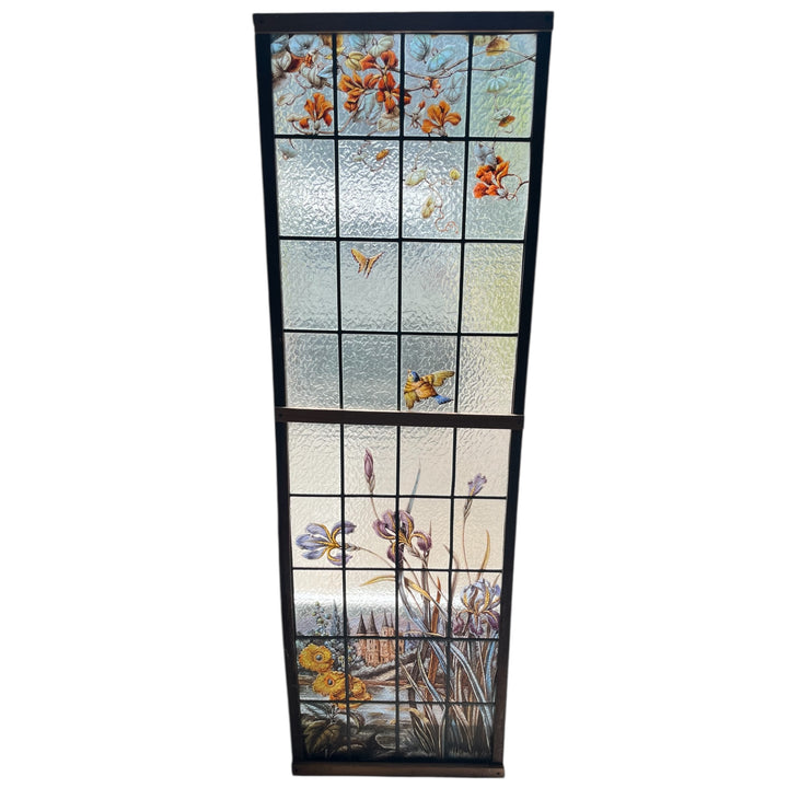 Art Nouveau stained glass window with irises and Loire Castle