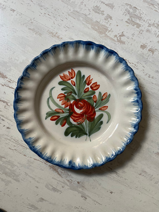 Auvillar earthenware plate decorated with polychrome floral bouquet 19th century