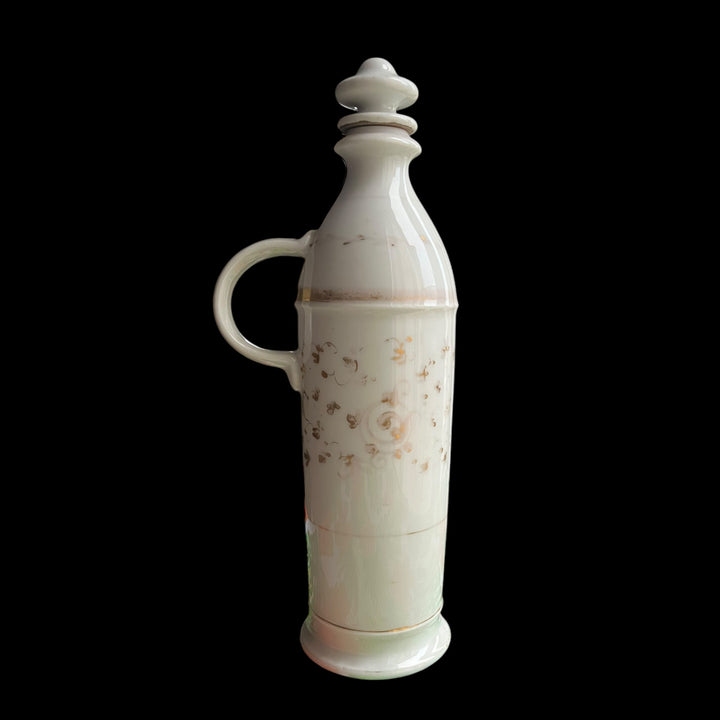 Bouteille en porcelaine de Paris liqueur XIXe