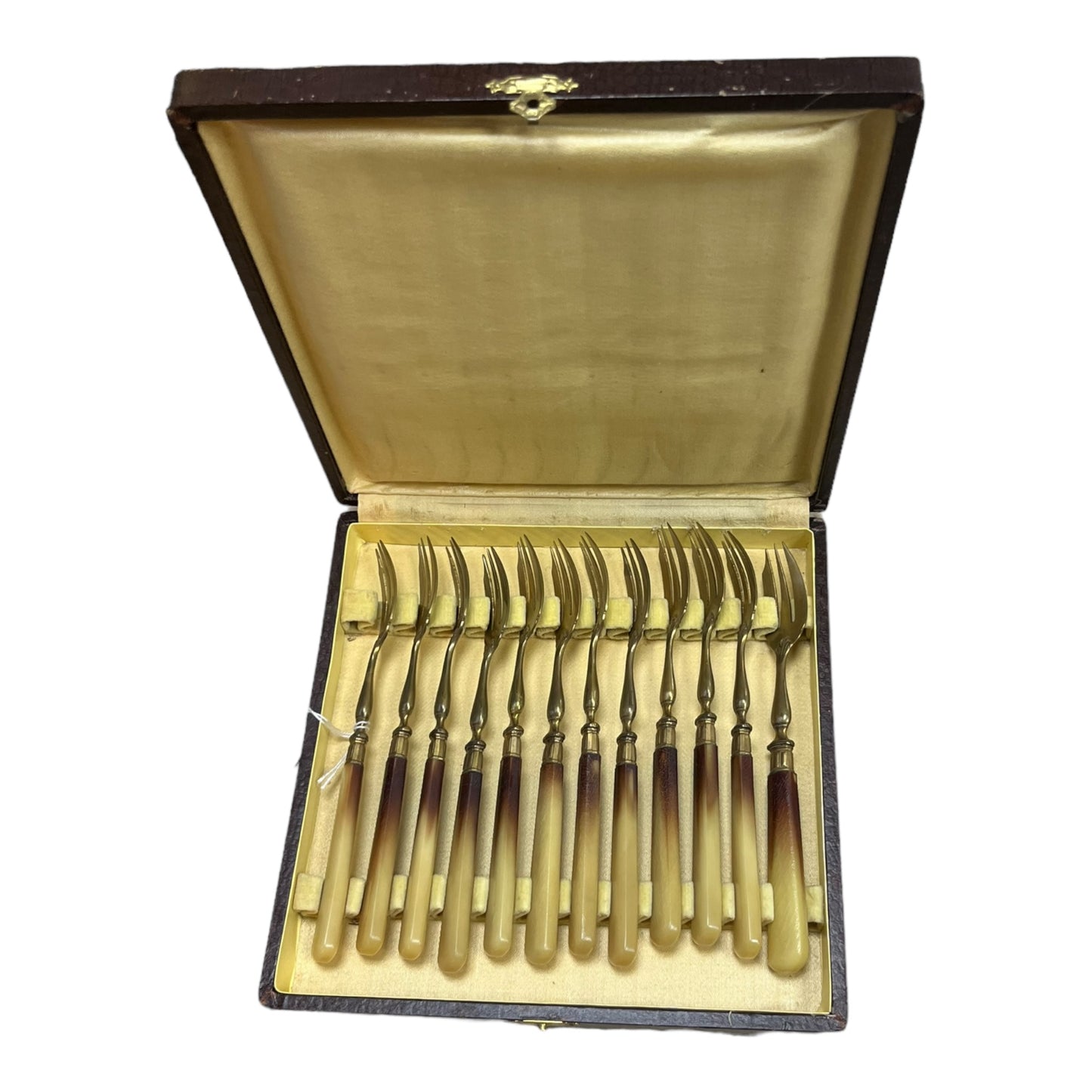 Housewife 12 dessert forks in brass and Bakelite