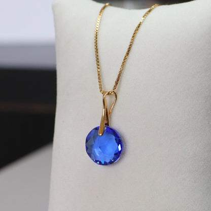 Pendant, Swarovski crystals, gold-plated silver, blue, BONBON