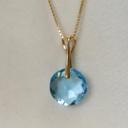 Pendant, Swarovski crystals, gold-plated silver, aquamarine blue, BONBON