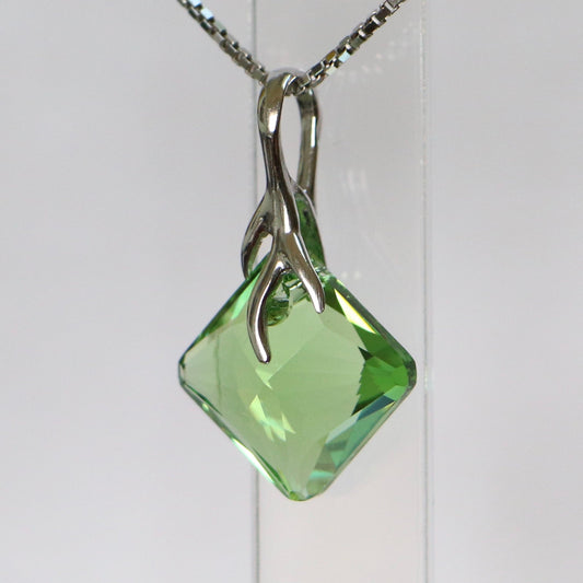 Pendant, Swarovski crystals, rhodium-plated silver, olive green, AGATHE