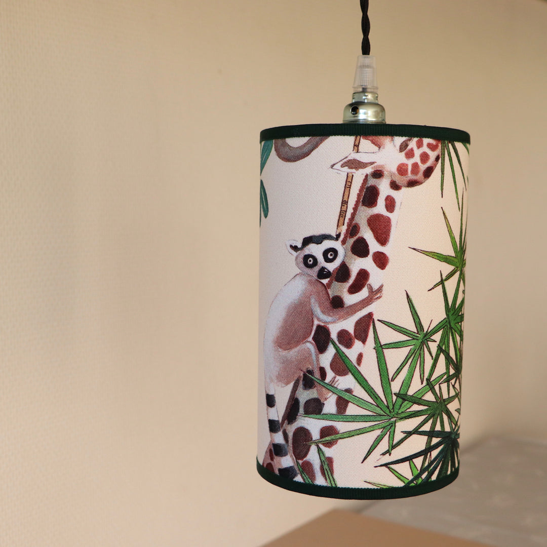 Portable lamp with a laminated lampshade in LEMOURS fabric