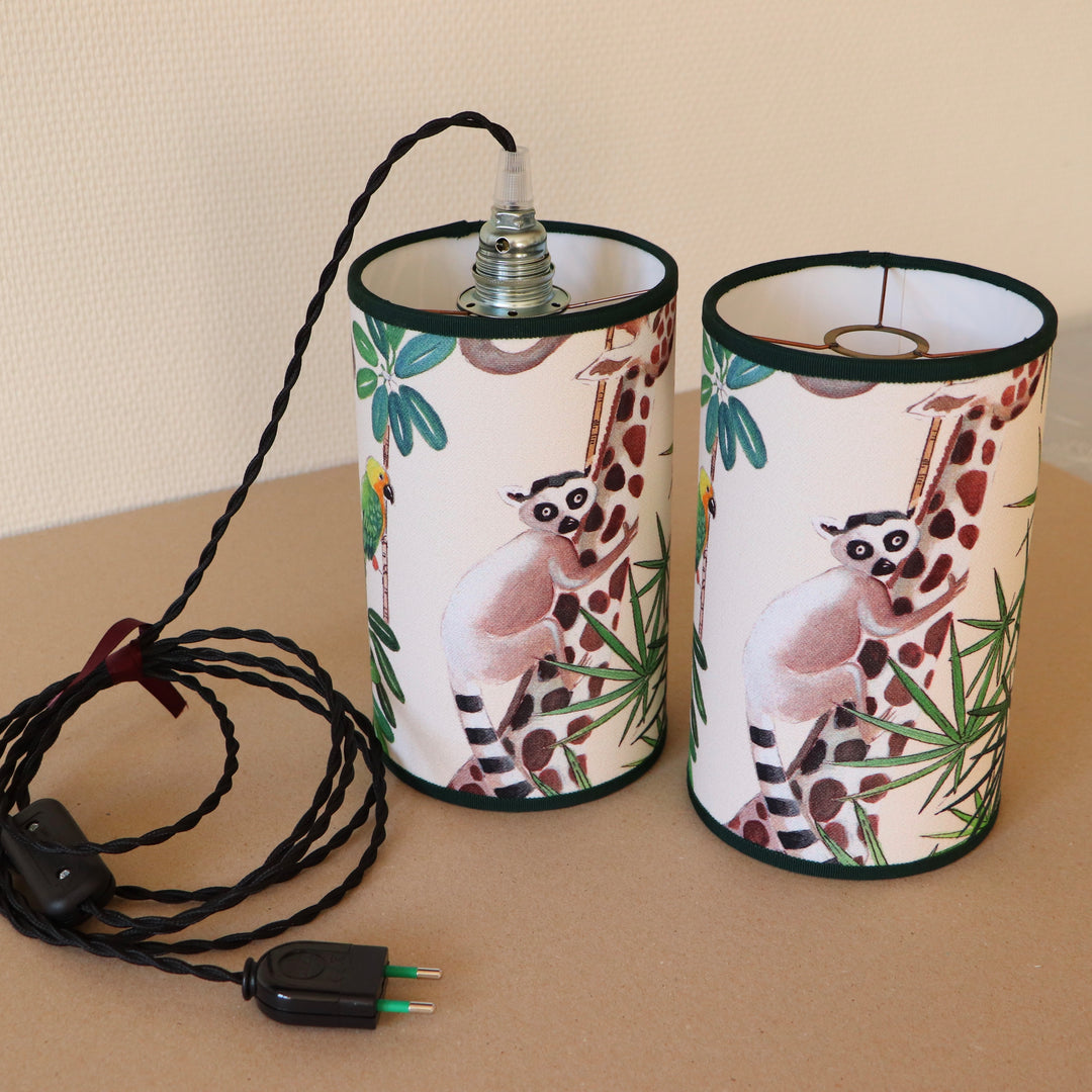 Portable lamp with a laminated lampshade in LEMOURS fabric