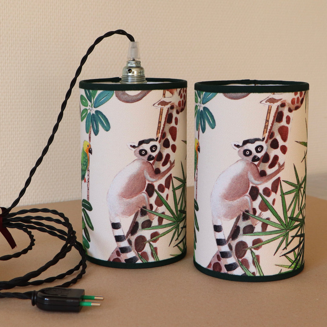 Portable lamp with a laminated lampshade in LEMOURS fabric