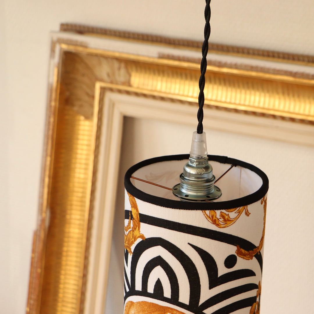 Portable lamp with a laminated lampshade in ANTIQUE fabric