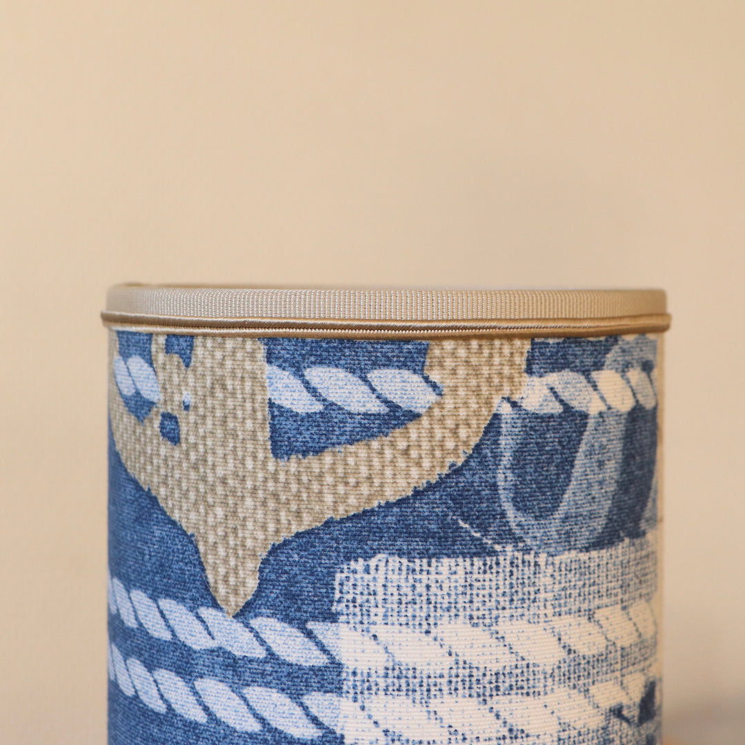 Portable lamp with a laminated lampshade in COQUILLE fabric