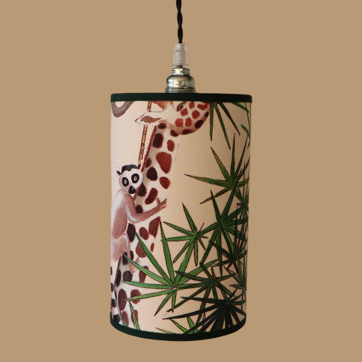 Portable lamp with a laminated lampshade in LEMOURS fabric