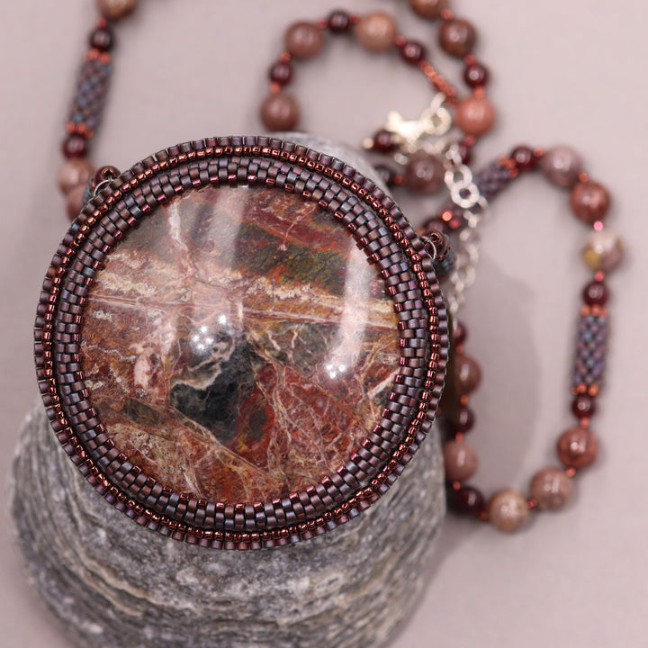 Embroidered necklace with listwaenite and coffee jasper