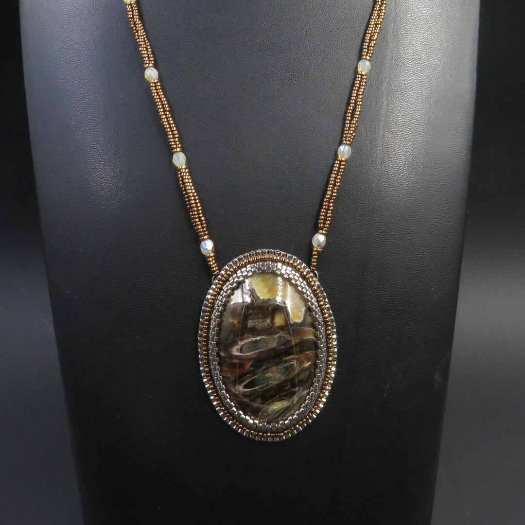 Embroidered necklace with pyritized ammonite, yellow calcite, ammolite CLB14