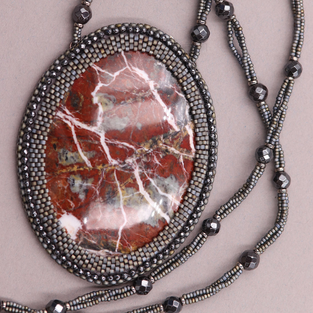 Embroidered necklace with red jasper