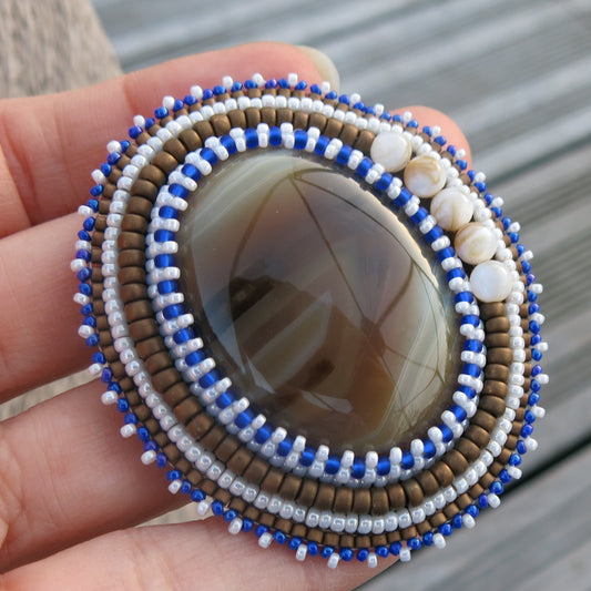 Embroidered brooch, agate, blue brown