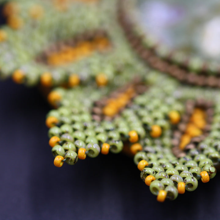 Embroidered necklace with rhyolite jasper