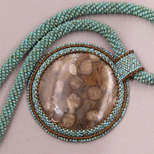 Necklace with fossilized coral 