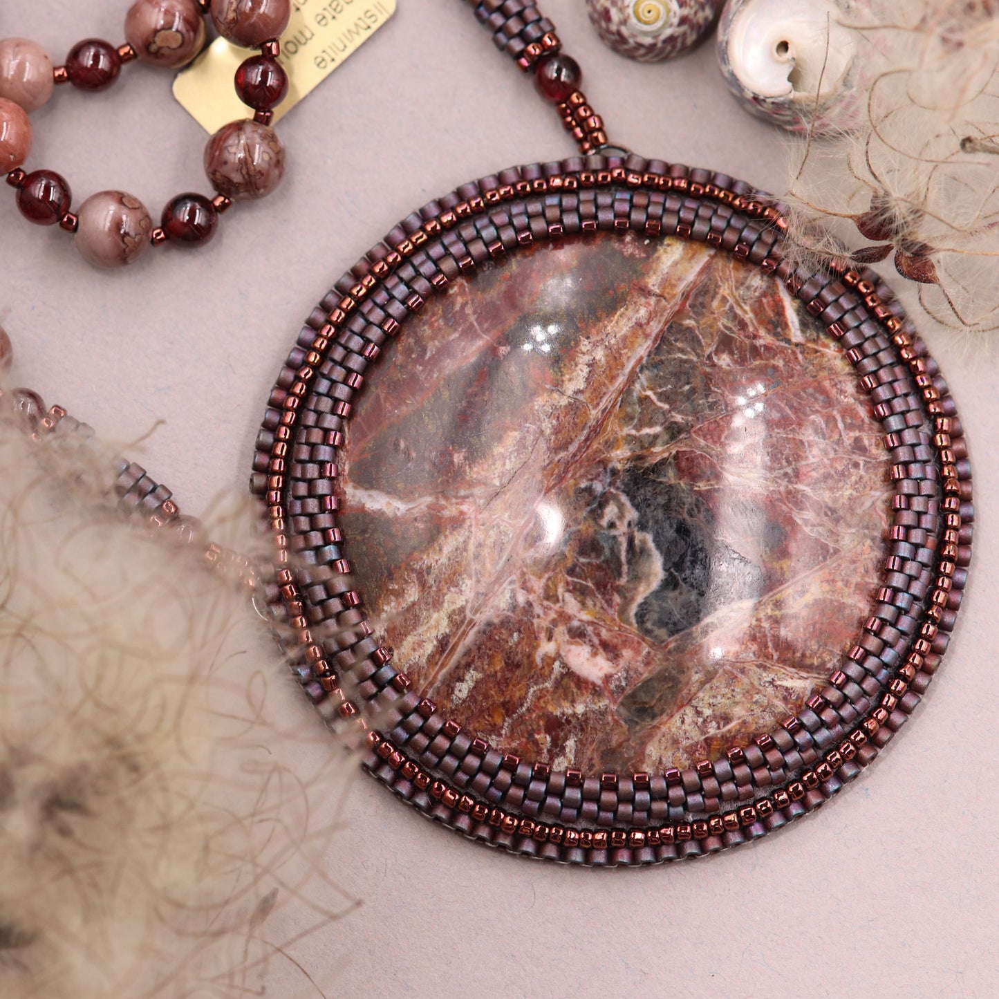 Embroidered necklace with listwaenite and coffee jasper