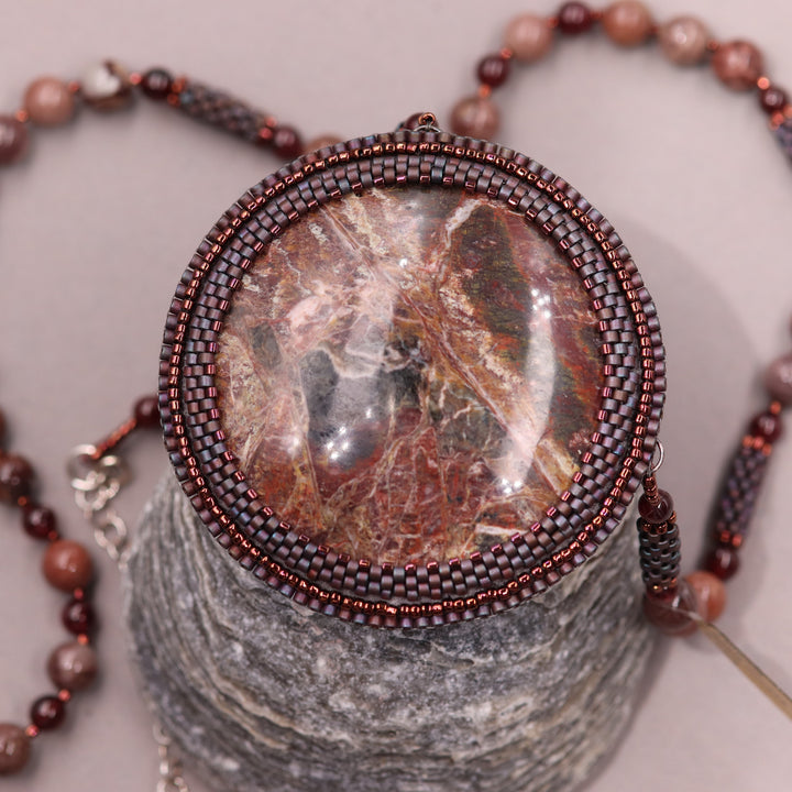 Embroidered necklace with listwaenite and coffee jasper