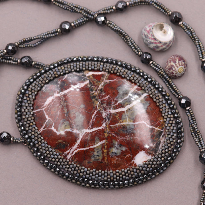 Embroidered necklace with red jasper